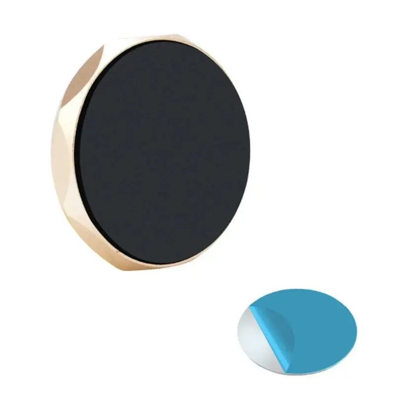 a black and blue circle with a gold ring