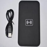 a black box with a usb and a cable