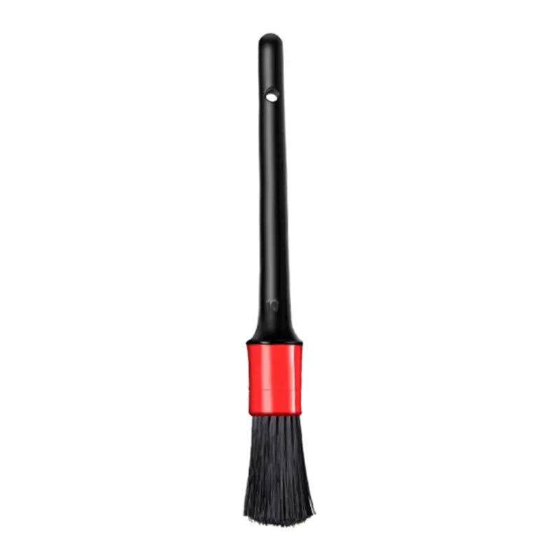 a black and red broom with a black handle