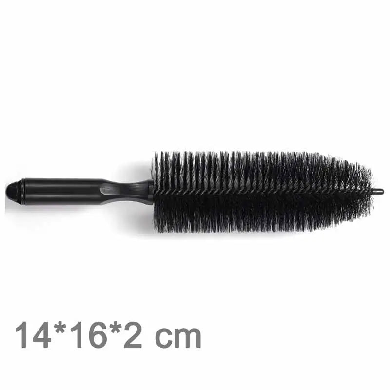 a black brush with a black handle