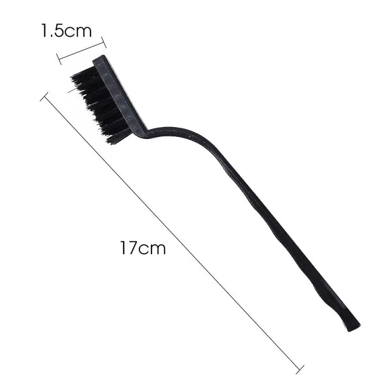 a black brush with a long handle