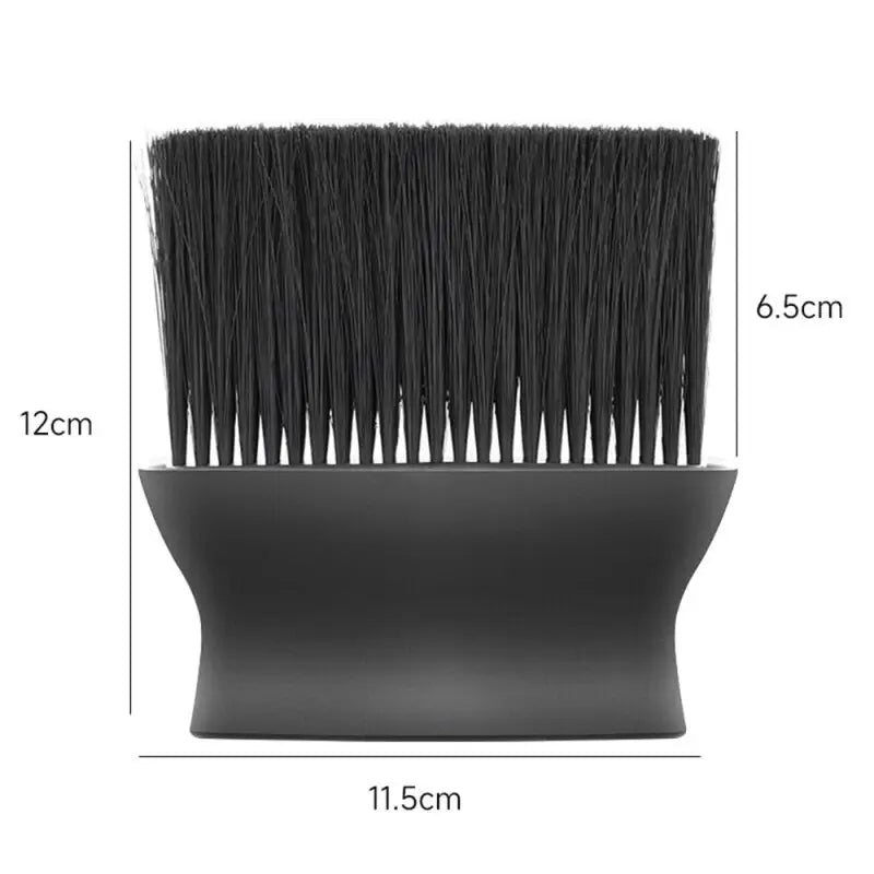 a black brush with a white handle