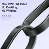 a black cable with a white background and a blue sky
