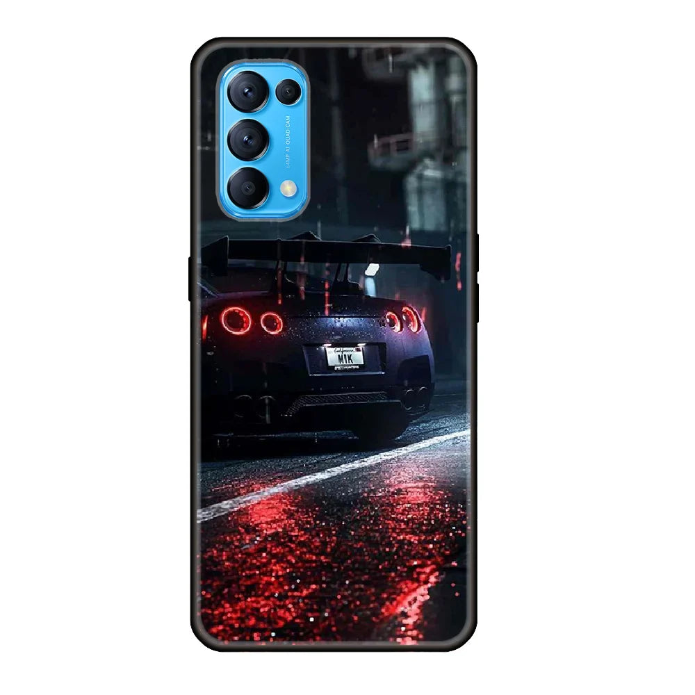 a black car with red lights on the street phone case