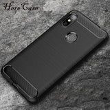 a black case with a carbon fiber texture on the back