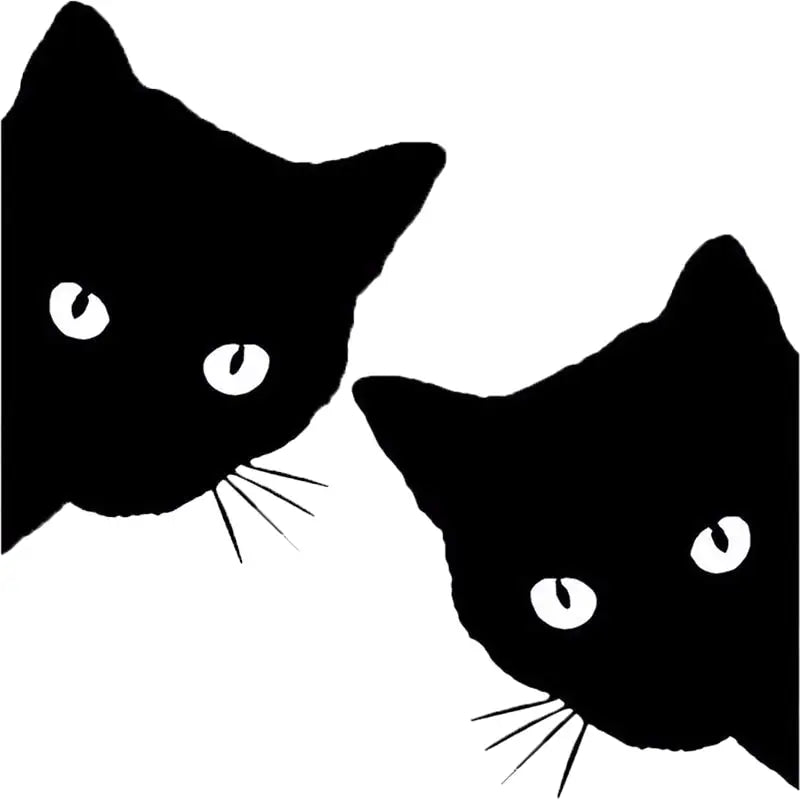 two black cats with white eyes