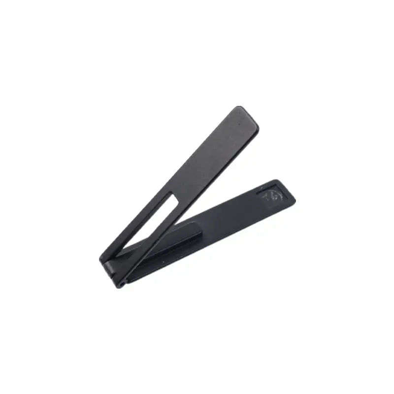 a black plastic clip with a white background