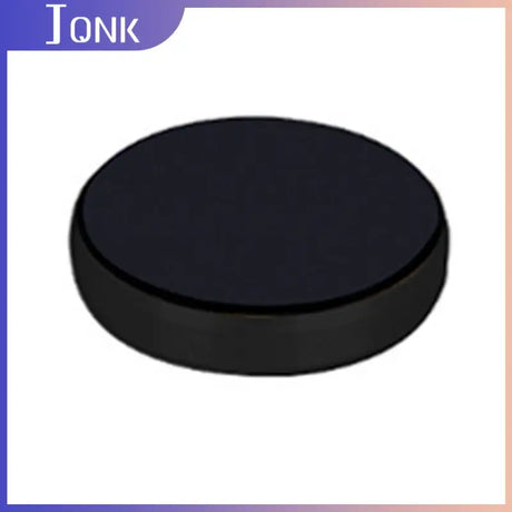 a black hockey puck with a white background