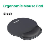 Black ergonomic mouse pad with a wrist rest.