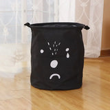a black bag with a face drawn on it