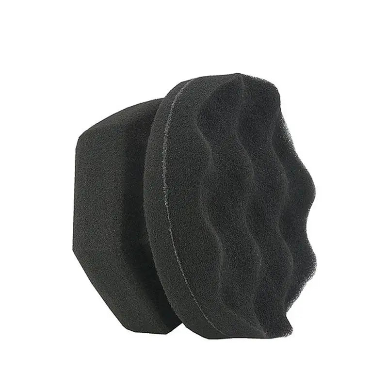 a black sponge on a white background