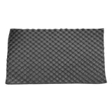 a black foam mat with a white background