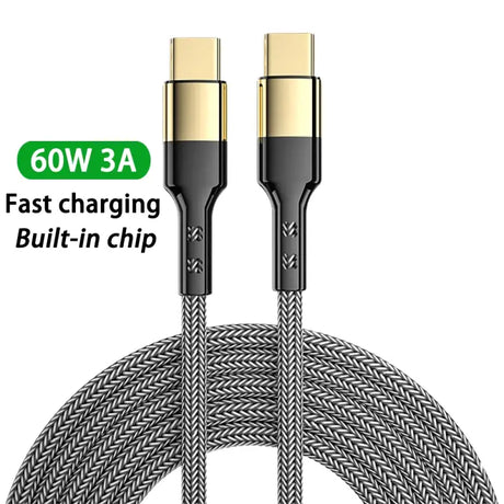 A black and gold braided usb cable with a green logo