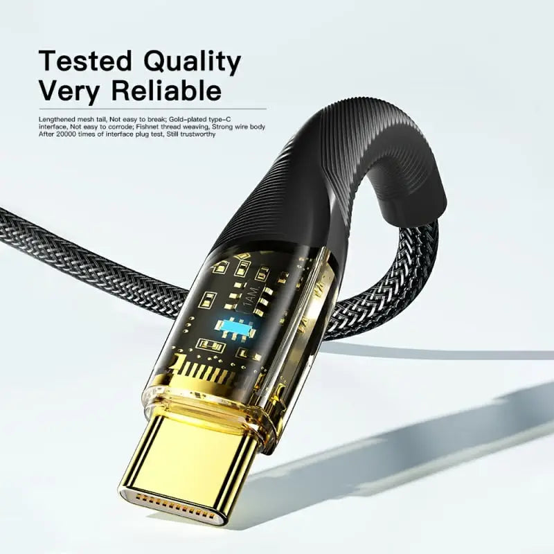 a black and gold cable connected to a white background