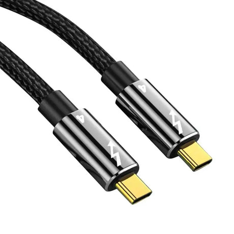 a black and gold cable with a white background