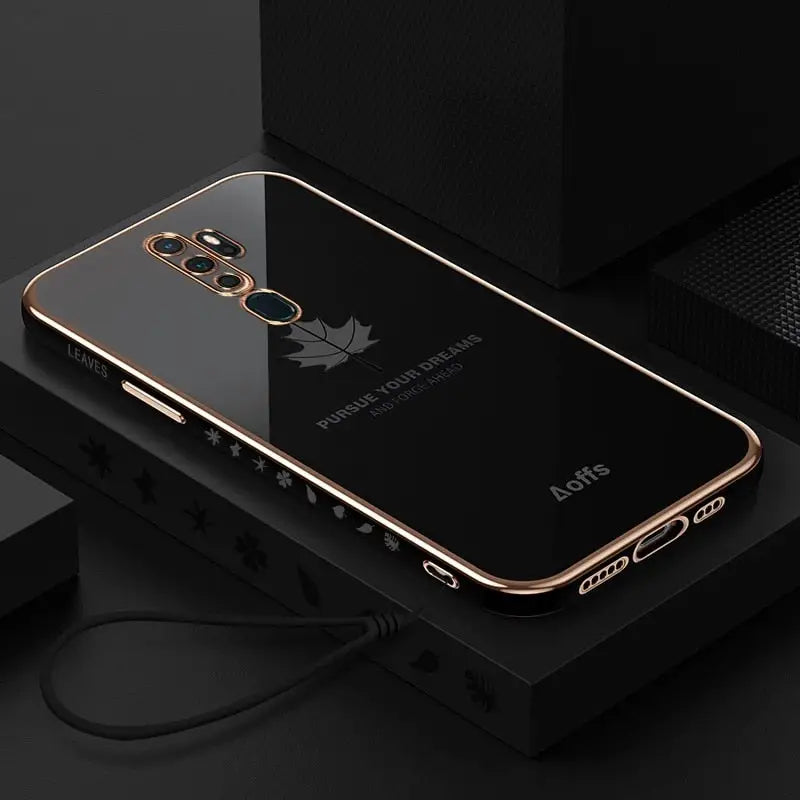 the iphone case is shown in gold