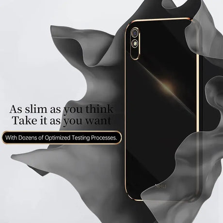 A black and gold iphone with the text as i amtk