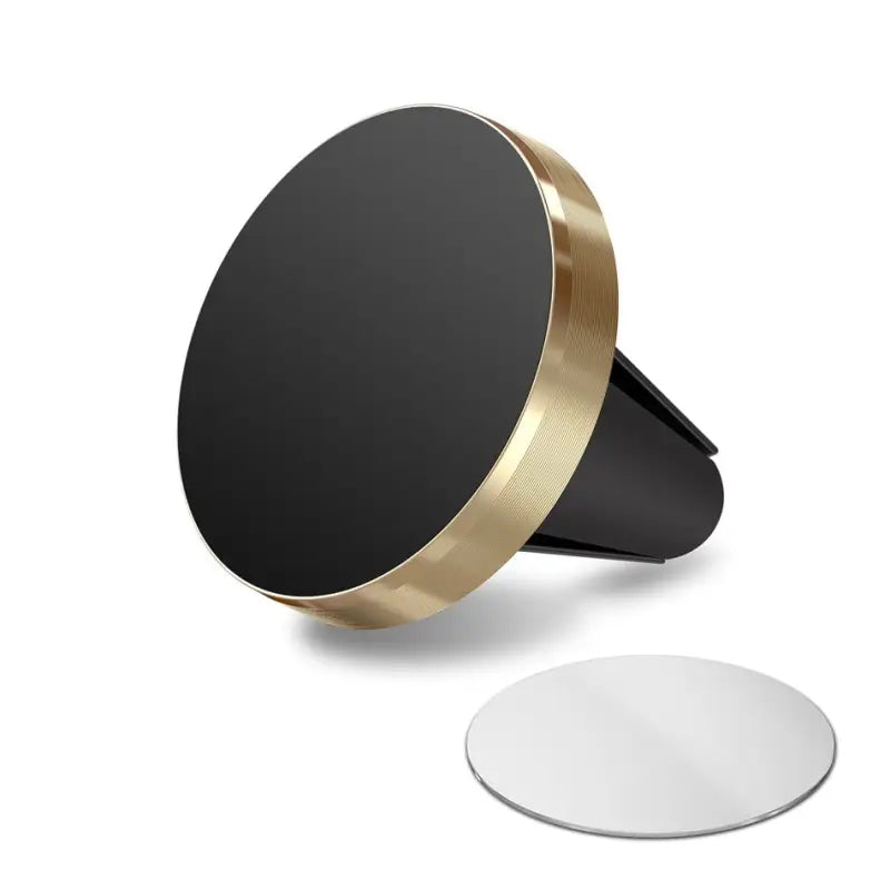 a black and gold ring with a white circle