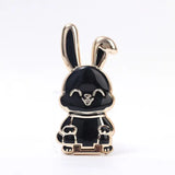 a black and gold rabbit figuri