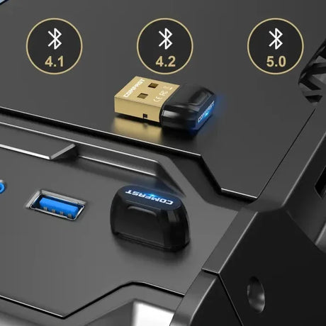 A black and gold usb with a blue light