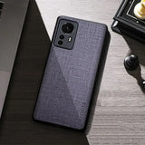 the back of a black and gray case on a desk