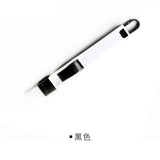 a pen with a black handle on a white background