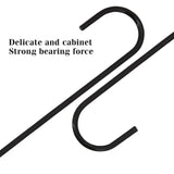 a black metal hook with the words,’delicate and strong force ’
