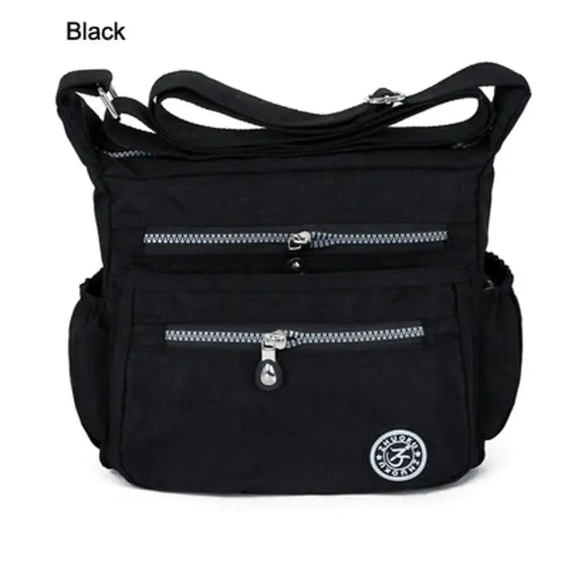 a black bag with zippers and a zipper