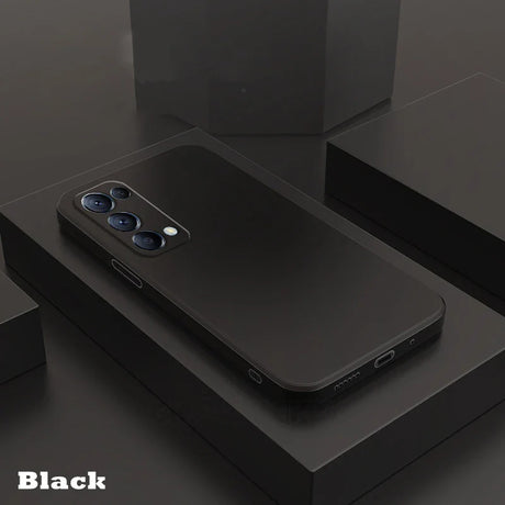 the back of a black iphone with a black box