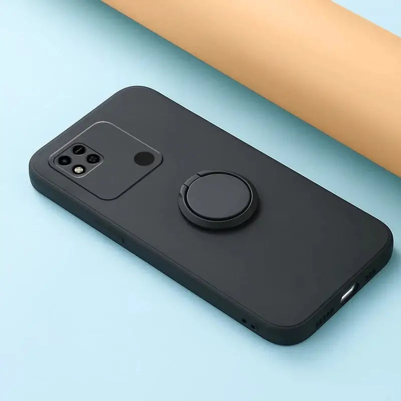 the back of a black iphone case with a camera attached to it