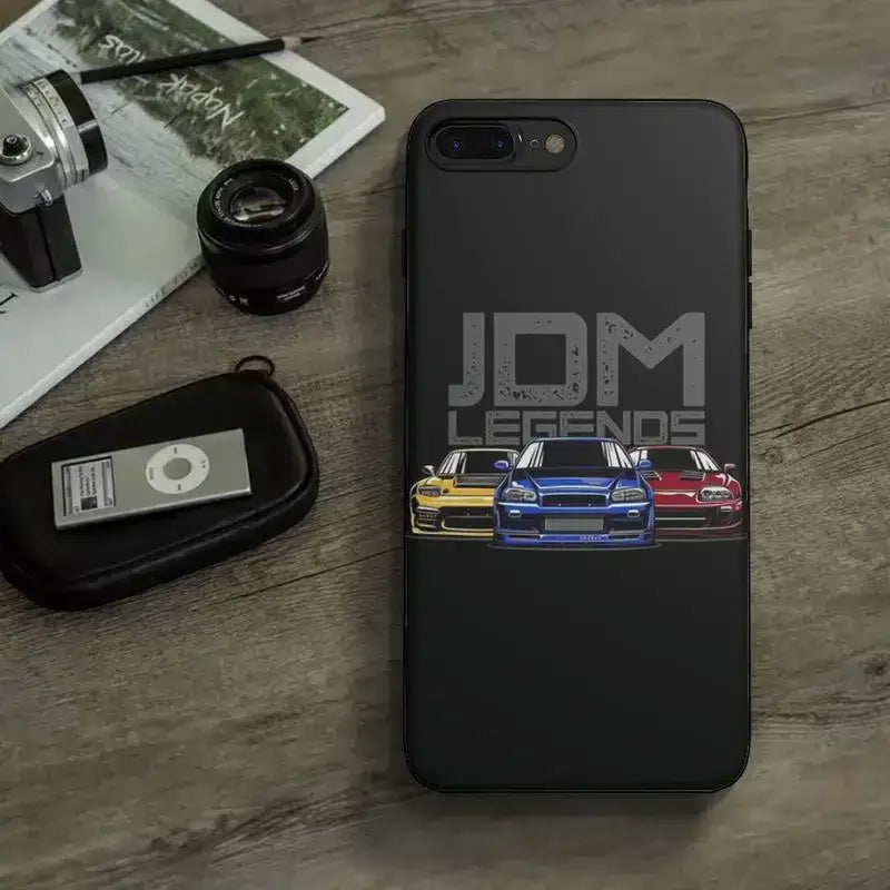 the back of a black iphone case with a car on it