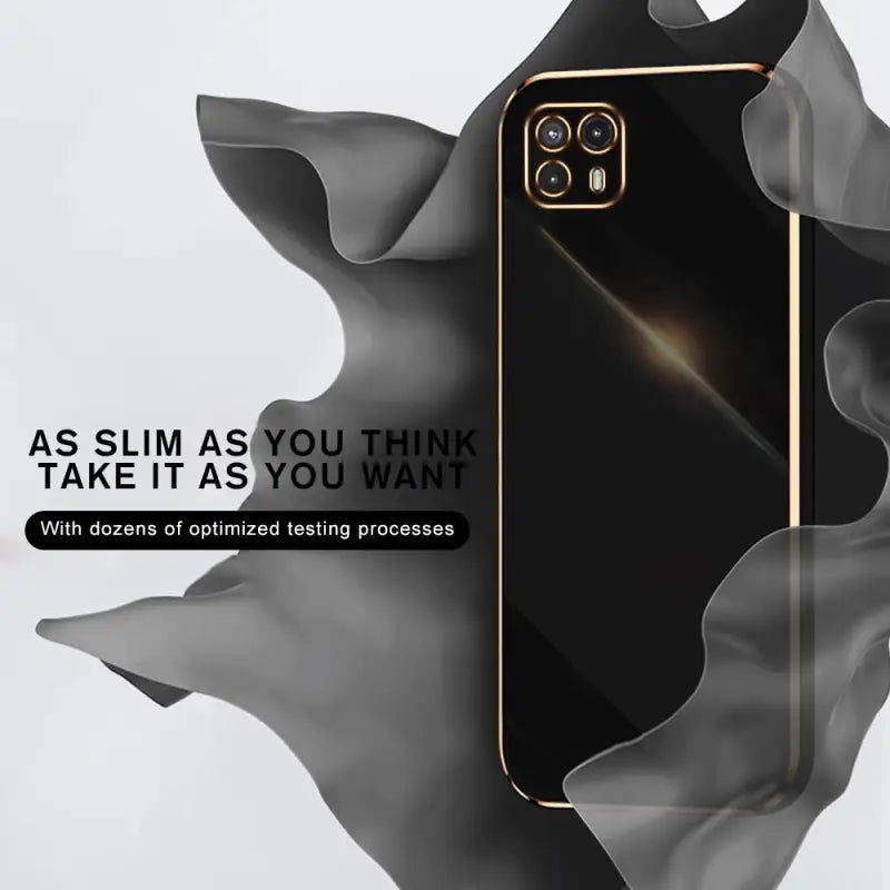 a black phone with a gold frame on it