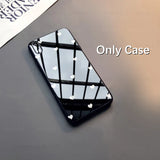 a black iphone case with a heart design
