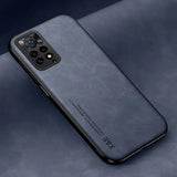 The back of a black iphone case with a black leather texture