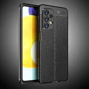 the back of a black iphone case with a leather texture