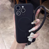 Black iPhone case with a magnetic circle and a black braided lanyard.