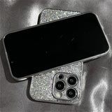 A black iphone case with silver glitter