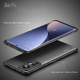 the back of a black iphone with a glass screen protector
