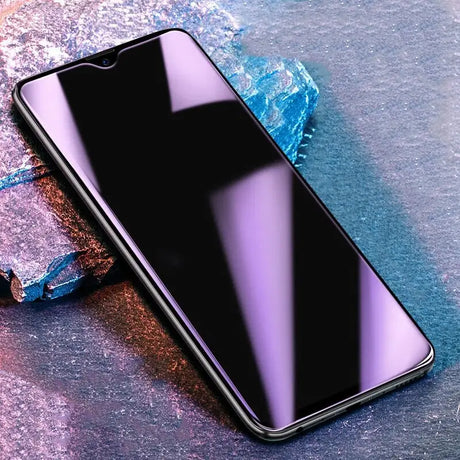 a black iphone with a purple background