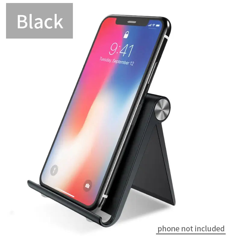 the black iphone x with a phone holder