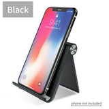 The black iphone x with a stand