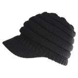 a black hat with a cable knit pattern