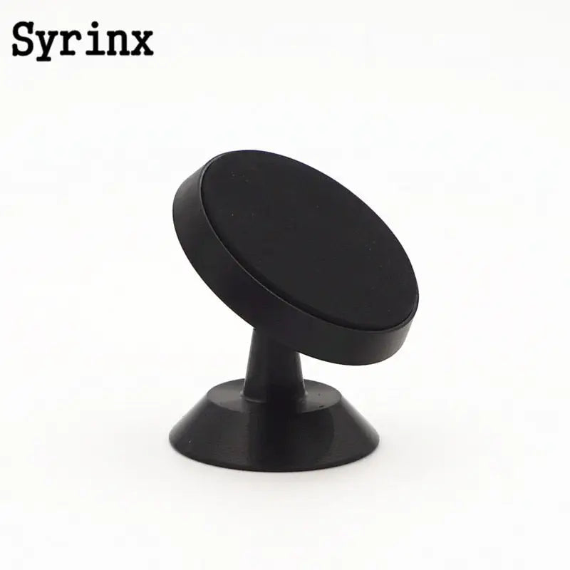 a black round knob on a white background