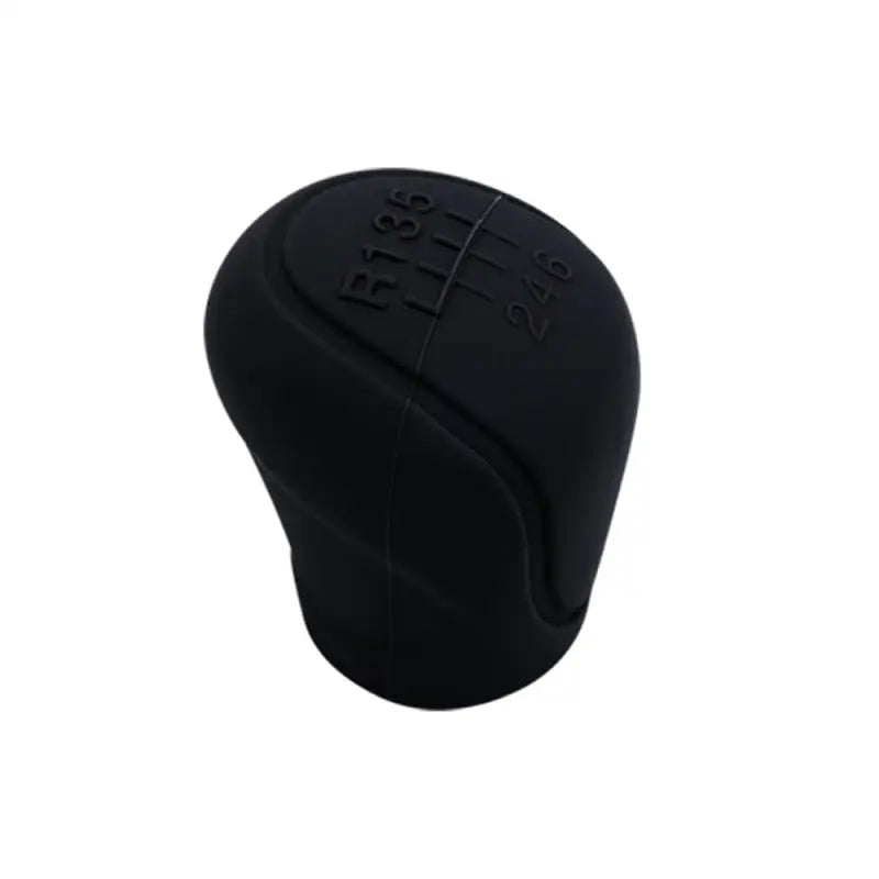 a black knob with a cross on it