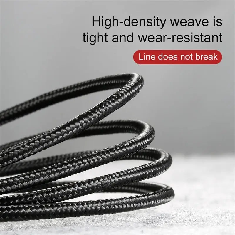 a black leather bracelet with a red button on it
