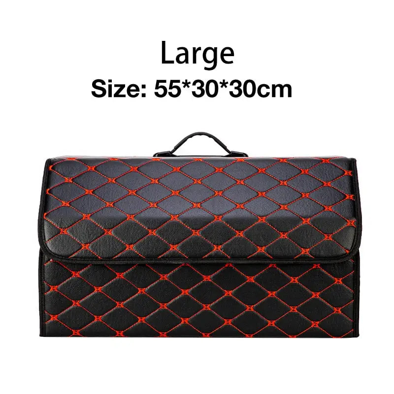 a black and red leather bag with a red pattern