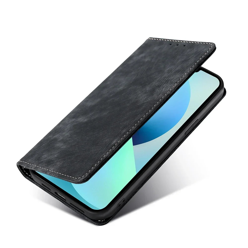 the back of a black leather case with a blue and green design
