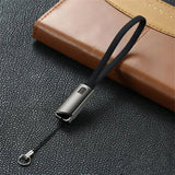a black leather case with a metal clasp