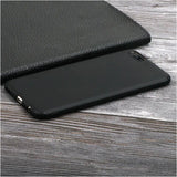 the back of a black leather case with a black leather cover