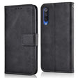 the back of a black leather case with a blue stitching